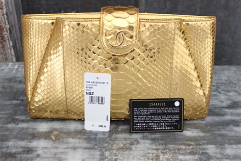 chanel clutch gold|Chanel denim clutch.